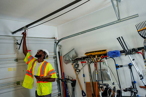 Professional Garage Door Panel Replacement technician working in Fairport, NY